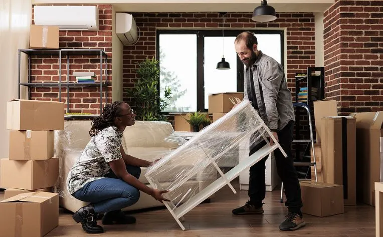 a man and a woman working on a project